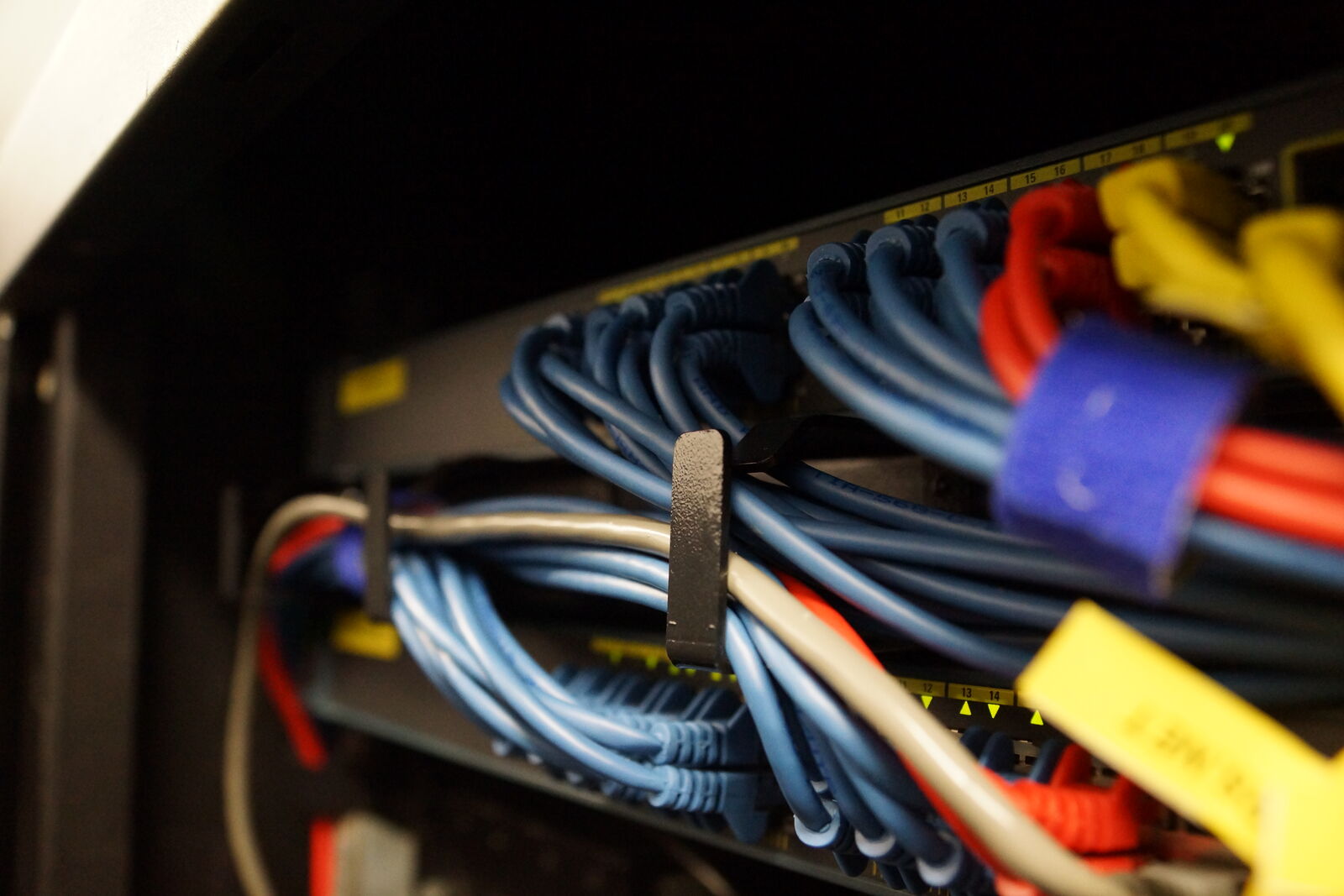 Neatly dressed patch cabling in a rack at Reliance House Datacentre